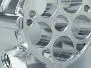 As-machined aluminum CNC machined component with multiple precision holes and industrial surface finish
